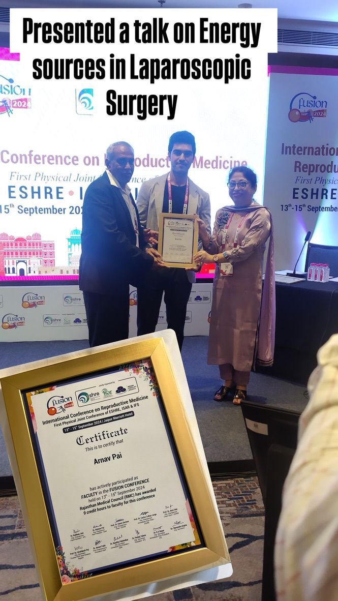 Dr. Arnav Pai receiving professional recognition at a laparoscopic surgery conference